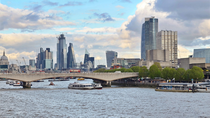 23 - View looking across the River Thames toward the City of London skyline, with Waterloo Bridge spanning the foreground